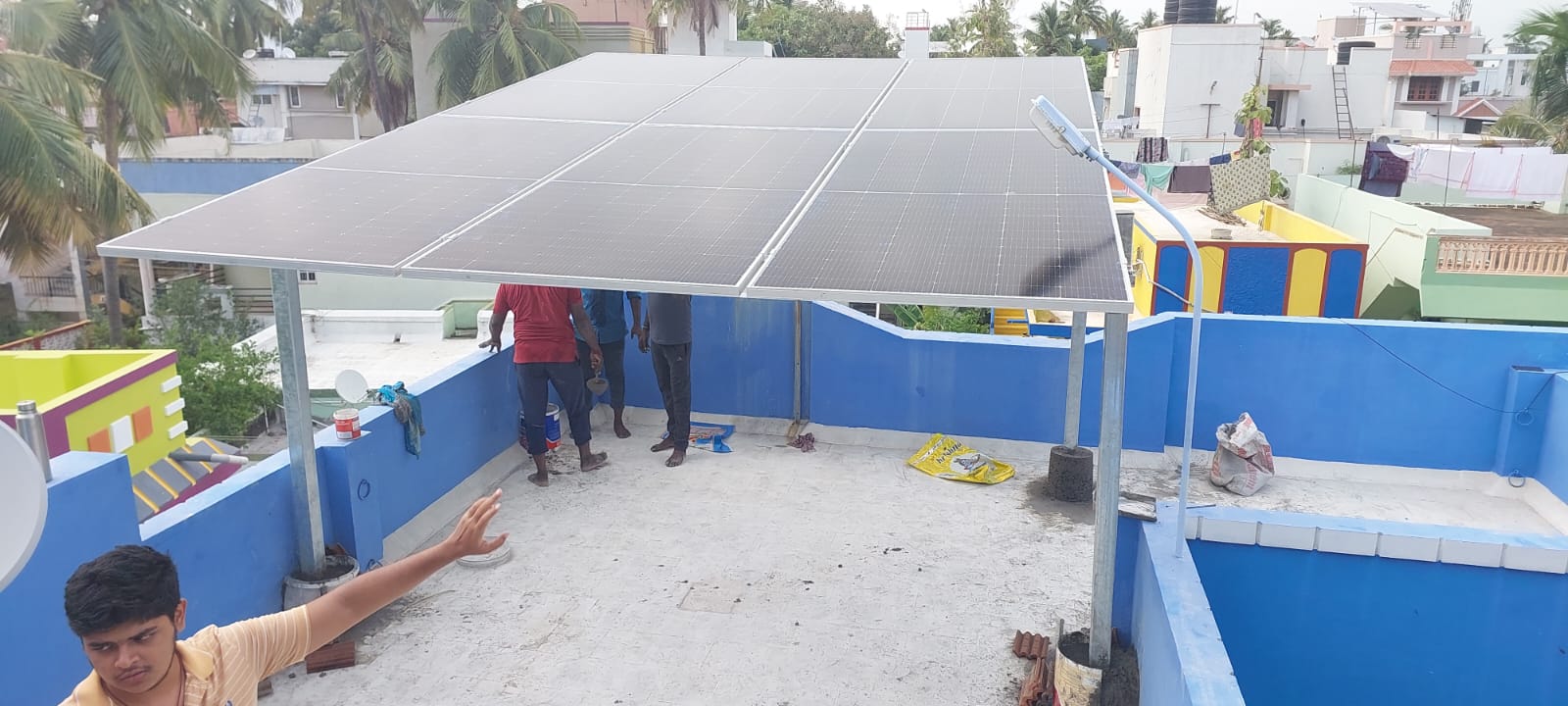 3.3kW solar panels installed on an open terrace (mottamadi) for efficient energy generation.