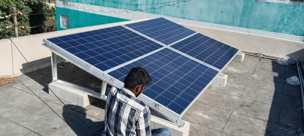  Technician installing solar panel